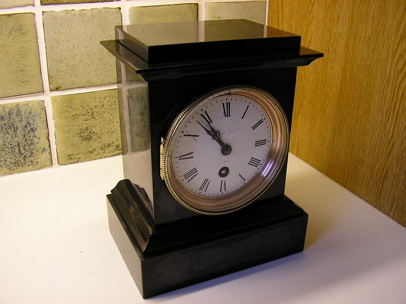 P2070005.JPG - Black Slate holding a French time only movement. Cleaned & serviced.
